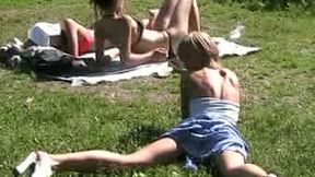 Beautiful and joyful blonde teen in the park flashes her pussy