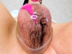 Kinky camgirl inflates hairy pussy with vacuum pump