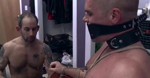 Training the bald lad by tying him to a chair and using toys