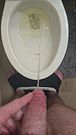 Huge cumshot and pissing in the bathroom
