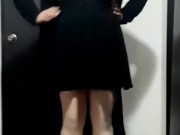 Cute crossdresser wearing dress and heels