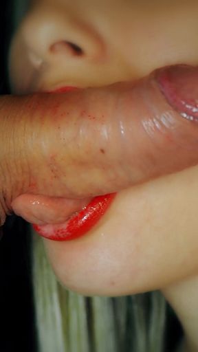 A hot blonde with red lips sucks a hard dick without hands for a long time and tenderly   Clip 1