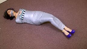 Girl Wrapped Up In Silver Tape