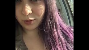 Naughty curvy girl winks at the camera while she masturbates in public