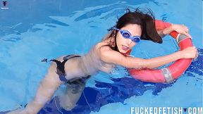 Brunette mermaid Helen Star wets her big natural tits in pool