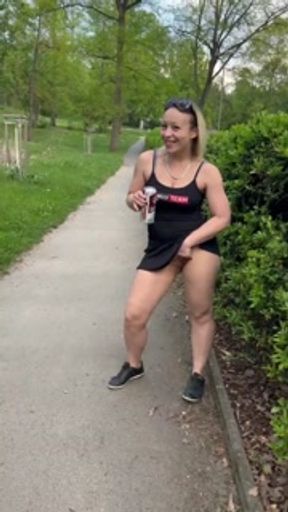 Walking with anal plug and piss on the path