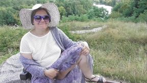 Mature woman with hairy bush flashes her pussy on the carriage