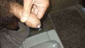 Indian man masterbation in the toilet