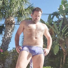 Hairy daddy strips off his singlet and cums hard!