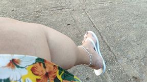 In the middle of the park leaving my flip-flops dangling from my feet (1)