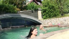 Blonde Uses Purple Toy on Brunette by the Pool
