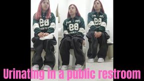 Urinating in a public restroom