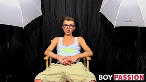 Hung twink Tanner Sharp interviewed and fucks dildo solo