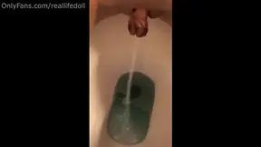 Petite girl pees in closeup