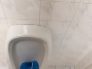 Peeing and moaning after pee desperation at the public urinal