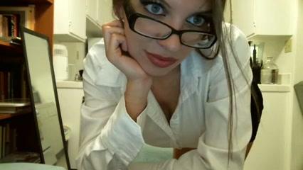 Gorgeous secretary with huge silicon boobs playing with her pussy