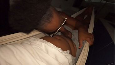 Hot AFro girl gives a stunning BBC a wet blowjob in the sun