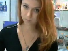 Pretty Redhead Fooling Around At Work