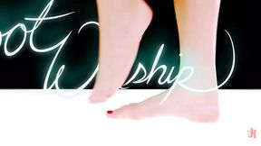 Seductive mistress teases foot slave with her perfect feet