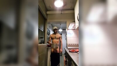 Muscular man has romantic sex in the kitchen