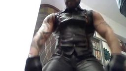 Vinx Putting on His Leather Outfit