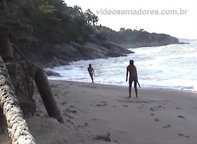 My girlfriend topless on the beach