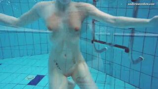 Gigantic boobies teens Liza Bubarek swimming nude into the pool