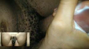 Masturbating