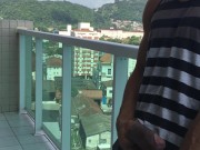 The public jack off on the balcony of the building.