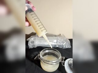 Loading 2 big sized syringes of my thawed cum loads to inject into my wife’s vagina