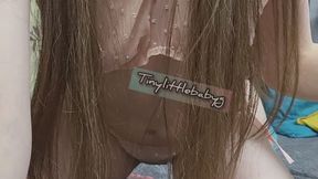 Feeling peachy in a matching mesh outfit Tinylittlebabyg playfully poses before removing her panties