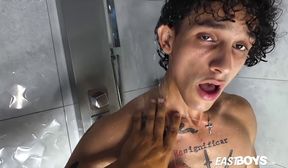 tattooed latino boy gets passionate handjob in wet shower