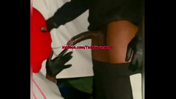 Man eating masked tranny sucking a thick long black dick