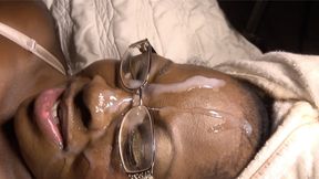 Black MILF sucks two big black dicks in homemade threesome