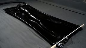New black latex bed