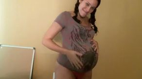 Kinky brunette preggo with braids was posing in her pink cute lingerie