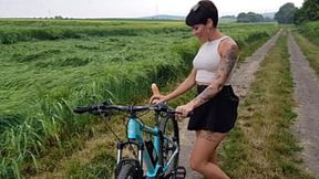 Hot babe gets fucked on a public bicycle