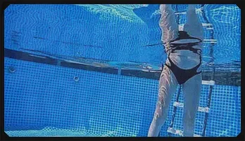 Sensual Underwater Striptease in the Pool