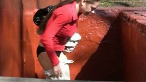 Russian lady Olga in the park pisses in her white pants