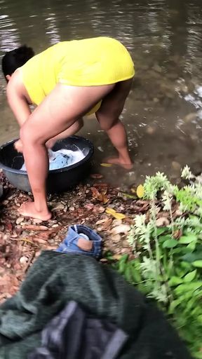 Pervert records me while I&#039;m washing in the river part2