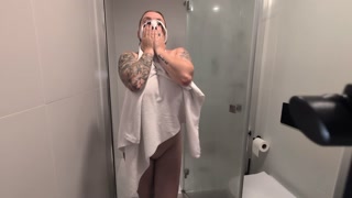 Shower and masturbation by a busty model with a big ass.