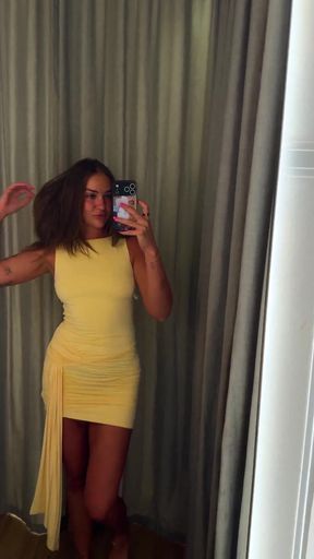 Blonde woman in yellow dress