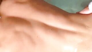 CEO fucks buff guy in a jacuzzi while wearing a suit and tie