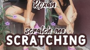 Roxan scratches her feet with her fingernails (3)