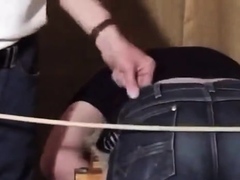 Caned over tight jeans Daddy boy