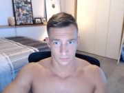 Handsome stud jerks off on cam