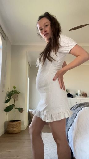 Pregnant strip tease