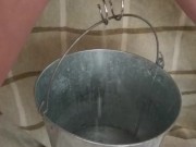 BDSM Pussy Labia Stretching Weight Torture Pissing in a Bucket Clamped Lips
