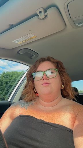 Curvy redhead BBW shows off her big tits
