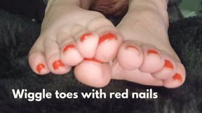 Wiggle toes with red nails
